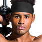 Person wearing the Qfitt black Active-Fit Headband during an active workout.