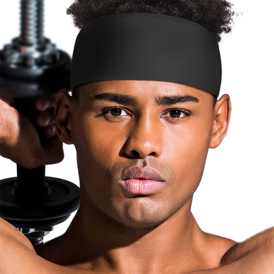 Person wearing the Qfitt black Active-Fit Headband during an active workout.
