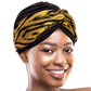 Qfitt Headband Turban with a stylish twisted design for comfortable everyday wear