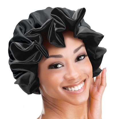 Black satin bonnet with ruffled edge worn by a smiling model