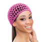 Woman wearing a doobie cap to help maintain a sleek hairstyle