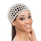 Woman wearing a doobie cap to help maintain a sleek hairstyle