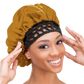 Woman wearing the Qfitt Doobie Cap With Silky Bonnet to help protect her wrapped hairstyle overnight.