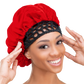 Woman wearing the Qfitt Doobie Cap With Silky Bonnet to help protect her wrapped hairstyle overnight.