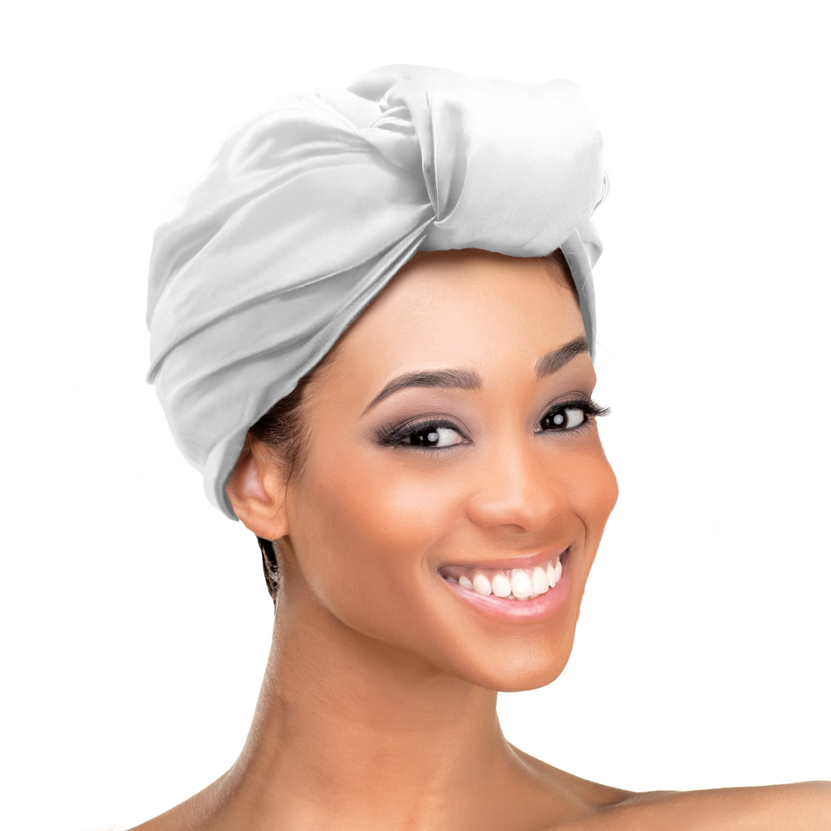 Woman wearing the Qfitt Doobie Cap With Silky Scarf, a hair wrap cap with an attached scarf.