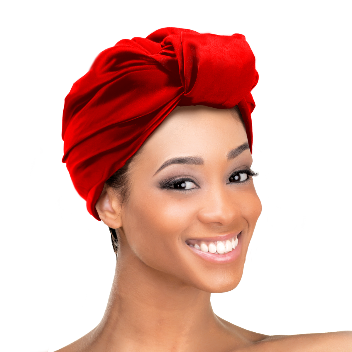 Woman wearing the Qfitt Doobie Cap With Silky Scarf, a hair wrap cap with an attached scarf.