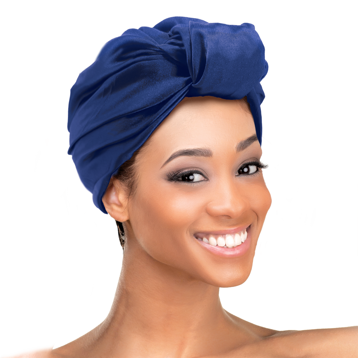 Woman wearing the Qfitt Doobie Cap With Silky Scarf, a hair wrap cap with an attached scarf.