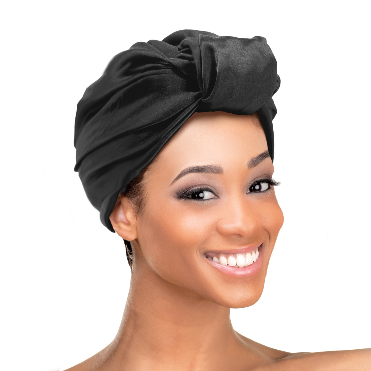Woman wearing the Qfitt Doobie Cap With Silky Scarf, a hair wrap cap with an attached scarf.