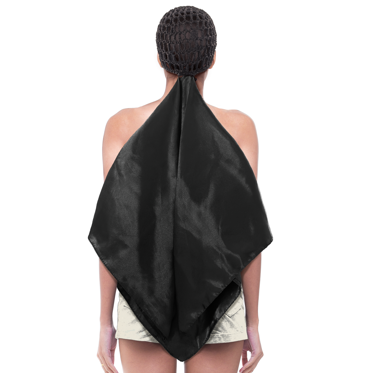 Woman wearing the Qfitt Doobie Cap With Silky Scarf, a hair wrap cap with an attached scarf.